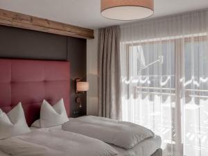 Posteľ alebo postele v izbe v ubytovaní Apartment Melisande 2 by Interhome