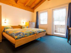Krevet ili kreveti u jedinici u okviru objekta Chalet Piccolo by Interhome