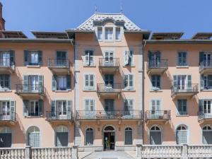 a large pink building with balconies on it at Apartment La résidence by Interhome in Saint-Gervais-les-Bains