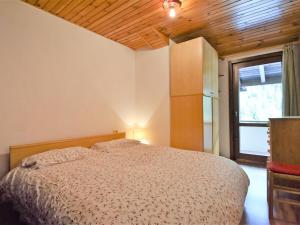 A bed or beds in a room at Apartment Frassan by Interhome