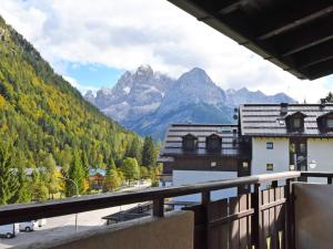 a view of the mountains from a balcony at Apartment Frassan Apartments-1 by Interhome in Madonna di Campiglio