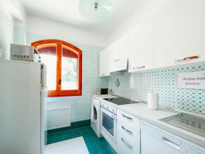 Kuchyňa alebo kuchynka v ubytovaní Apartment Pinta by Interhome