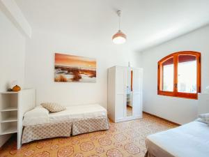 Posteľ alebo postele v izbe v ubytovaní Apartment Pinta by Interhome