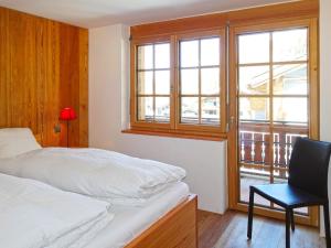 Postel nebo postele na pokoji v ubytování Apartment Bergere-2 by Interhome
