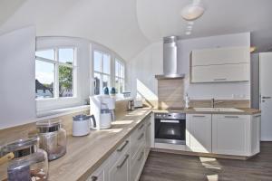 Dapur atau dapur kecil di Ferienhaus Zaunkönig FeWoOG - Balkon, Meerblick