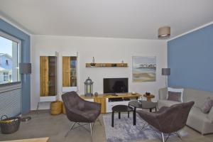 TV/Unterhaltungsangebot in der Unterkunft zentrale FeWo mit Balkon, gratis Nutzung vom AHOI Erlebnisbad und Sauna in Sellin - Villa Anni FeWo 05