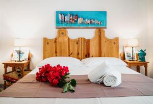 Posteľ alebo postele v izbe v ubytovaní Hotel Rojas