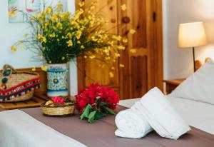 Posteľ alebo postele v izbe v ubytovaní Hotel Rojas