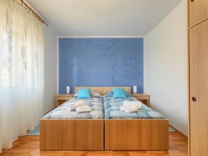 Postel nebo postele na pokoji v ubytování Apartment Chiara by Interhome