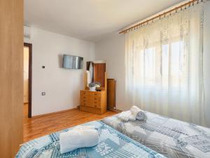 Postel nebo postele na pokoji v ubytování Apartment Chiara by Interhome
