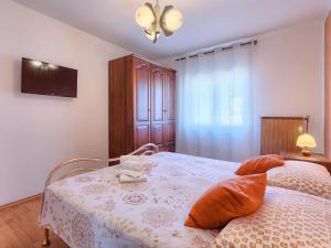 Postel nebo postele na pokoji v ubytování Apartment Chiara by Interhome