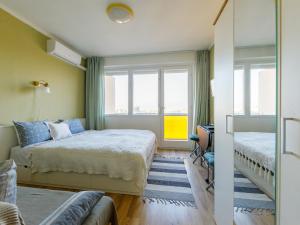 Posteľ alebo postele v izbe v ubytovaní Studio Golden Gate by Interhome