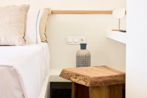 Łóżko lub łóżka w pokoju w obiekcie Syllac Elegant Stay