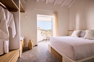 Łóżko lub łóżka w pokoju w obiekcie Syllac Elegant Stay