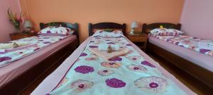 Postel nebo postele na pokoji v ubytování Guest House Dunavski Raj
