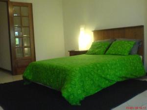 Ένα ή περισσότερα κρεβάτια σε δωμάτιο στο Apartment with Private Garden