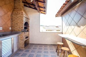 Η κουζίνα ή μικρή κουζίνα στο Duplex na Praia do Peró em Cabo Frio