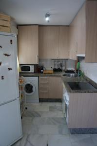 Kuchnia lub aneks kuchenny w obiekcie CASA BAIANA - Dúplex en Costa Ballena