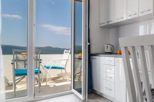 Kuchyň nebo kuchyňský kout v ubytování Apartmani MATE Neum