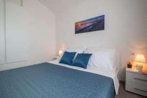 Postel nebo postele na pokoji v ubytování Apartmani MATE Neum