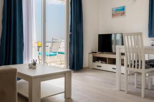 TV a/nebo společenská místnost v ubytování Apartmani MATE Neum