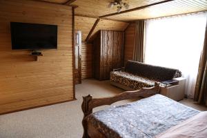 En eller flere senge i et værelse på Zatyshok v Karpatah