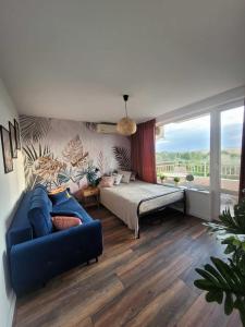 A bed or beds in a room at Nessebar Fort Club - Prestige Apartments