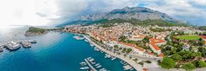 an aerial view of a harbor with boats in the water at Luxury Rooms Palace B&B in Makarska