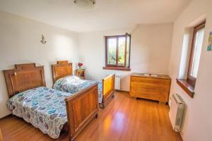 Tempat tidur dalam kamar di Casa Vacanza tra Cielo e Mare