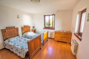 Postel nebo postele na pokoji v ubytování Casa Vacanza tra Cielo e Mare