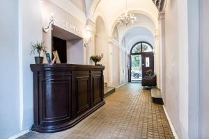 a hallway with a brown cabinet in a building at Aparthotel Old Town in Kraków