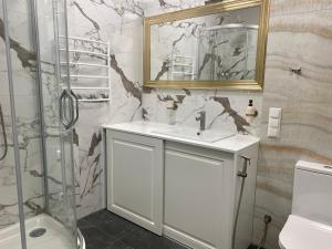 Kúpeľňa v ubytovaní MAGNIT Apartments у самого моря