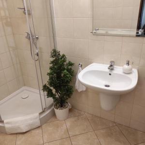 Kúpeľňa v ubytovaní Apartament Promenada Park Kołobrzeg