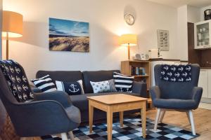 Posezení v ubytování strandnah, Balkon, AHOI Erlebnisbad gratis in Sellin - Strandresidenz Brandenburg FeWo 36