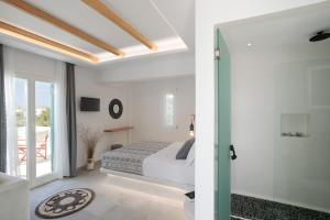 Кровать или кровати в номере Iades Studios & Apartments
