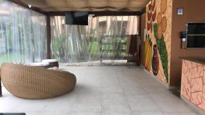 TV a/nebo společenská místnost v ubytování Angra dos Reis - Porto Bali - SUÍTE no Porto Bali Resort