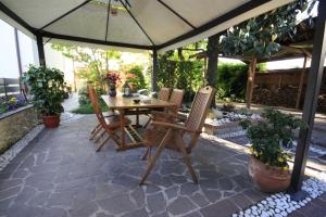 Κήπος έξω από το La Lanterna +12 φωτογραφίες