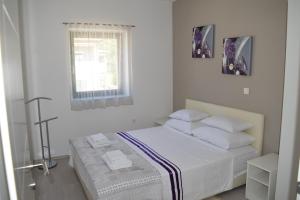 Postel nebo postele na pokoji v ubytování Villa Mio Mare