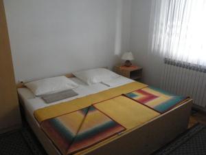 Giường trong phòng chung tại Guesthouse Anka