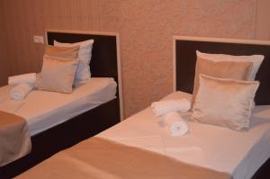 Postel nebo postele na pokoji v ubytování Hotel RichI G A