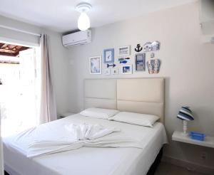 Postel nebo postele na pokoji v ubytování Apto 1110 - Golden Village Taperapuã + 28 fotografií