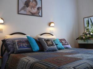 Cama ou camas em um quarto em Hotel Arlesiana