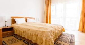 Ένα ή περισσότερα κρεβάτια σε δωμάτιο στο HOTEL ILA