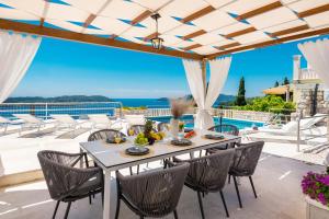 Posedenie v ubytovaní Villa Magnolia