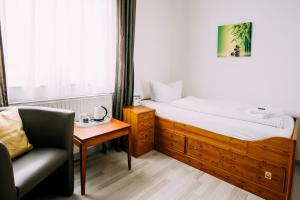 Postel nebo postele na pokoji v ubytování Hotel Brandaris
