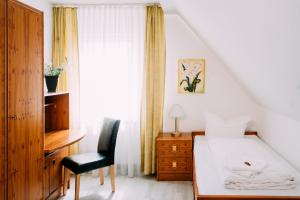 Postel nebo postele na pokoji v ubytování Hotel Brandaris