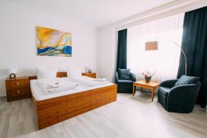 Postel nebo postele na pokoji v ubytování Hotel Brandaris
