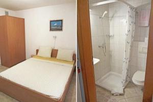 a bathroom with a bed and a shower and a toilet at Guest House Suzana in Omišalj +101 photos