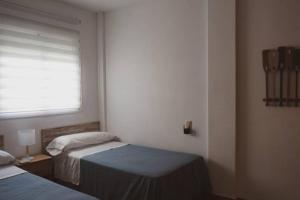Postel nebo postele na pokoji v ubytování Casa Indalmar II San José