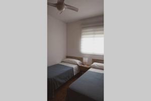 Postel nebo postele na pokoji v ubytování Casa Indalmar II San José